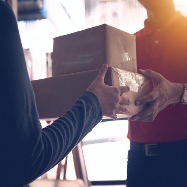 Hands holding packages